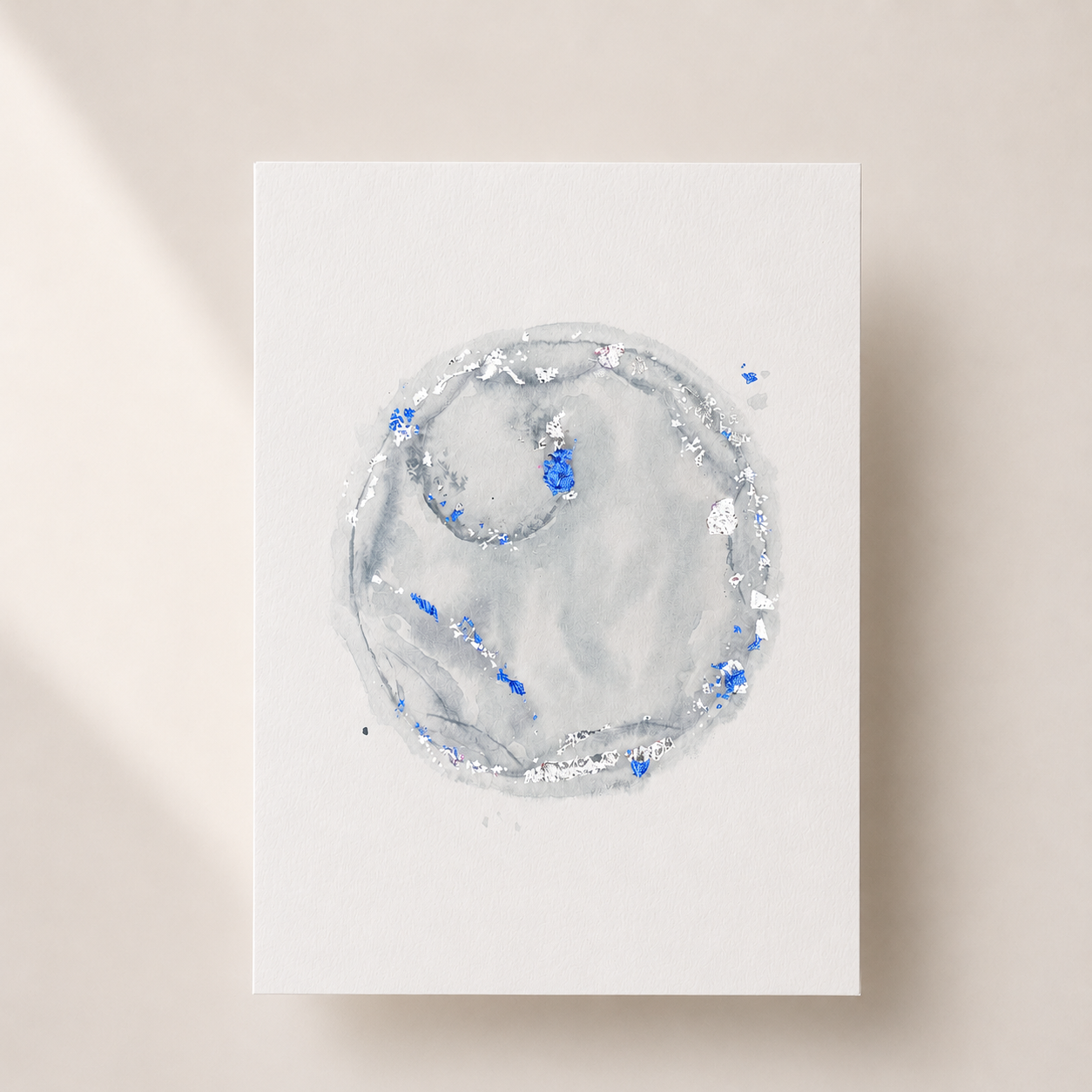 Abstract art piece with blue and gray colors on a white background