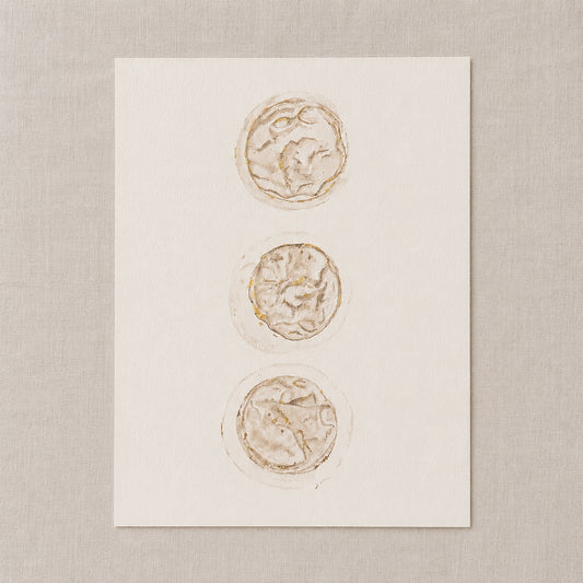 Watercolour painting of 3 embryos on a white card against a beige background